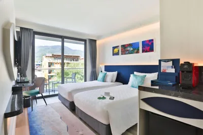 Quadruple Room with Balcony — Hotel Clover Patong Phuket